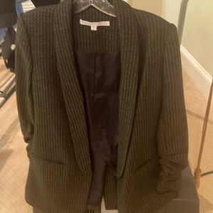 Tweed blazer with simple collar .No buttons.